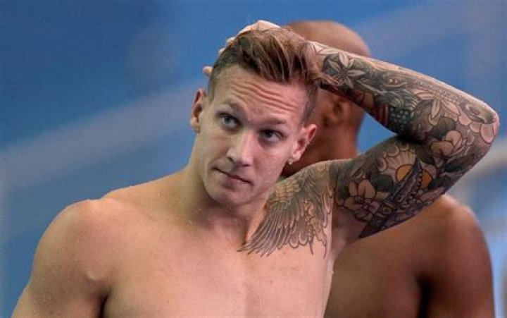 Look At All Of Caeleb Dressel’s Tattoos And Know Their Meaning