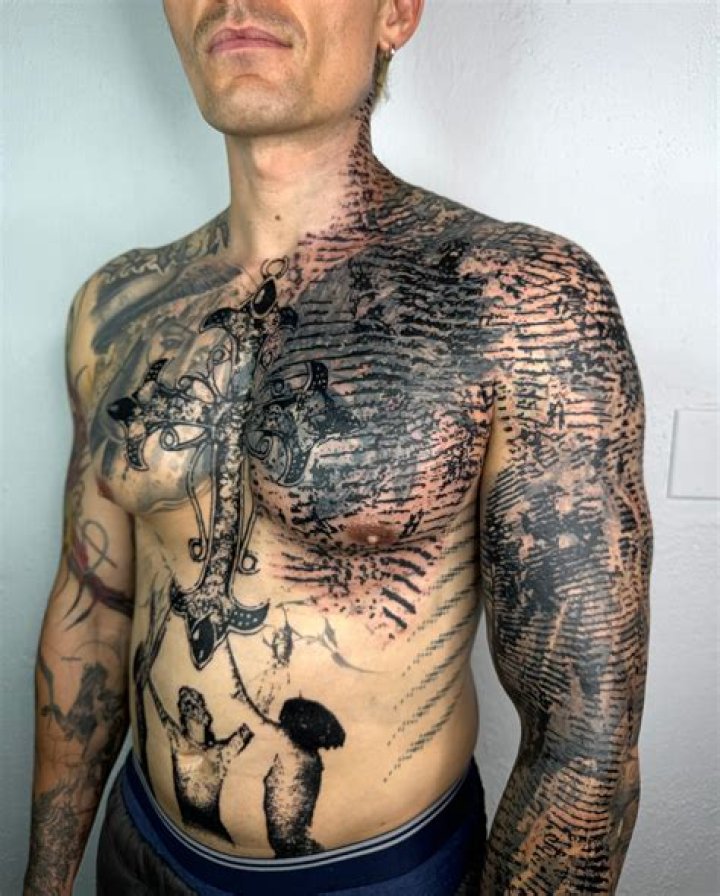 How Many Tattoos Does He Have? Explain